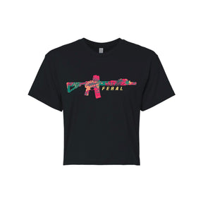 The Feral - Women's Crop by Tango Charlie Apparel is a black t-shirt with a vibrant abstract rifle graphic and "FERAL" in yellow—perfect for bold, unfiltered women's fashion.