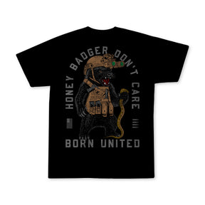 The Honey Badgerin Black T-shirt by Born United Private Label features an illustrated honey badger in tactical gear and night vision goggles holding a snake, with the text: HONEY BADGER DONT CARE and BORN UNITED.