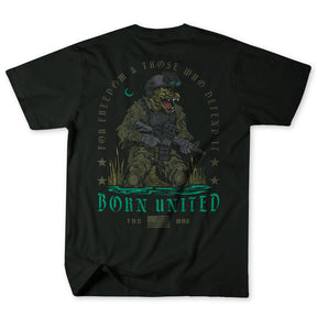 The Born United Private Label Black Box - Tactigator t-shirt features an alligator in military gear with a rifle, surrounded by "For Freedom & Those Who Defend It" and "Born United," plus stars and a crescent moon above.
