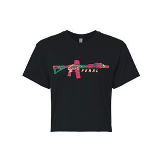 The Feral Crop Tee - Black by Tango Charlie Apparel is a comfyAF cotton-poly blend featuring a colorful abstract rifle illustration with “FERAL” in yellow underneath—perfect for all-day wear.