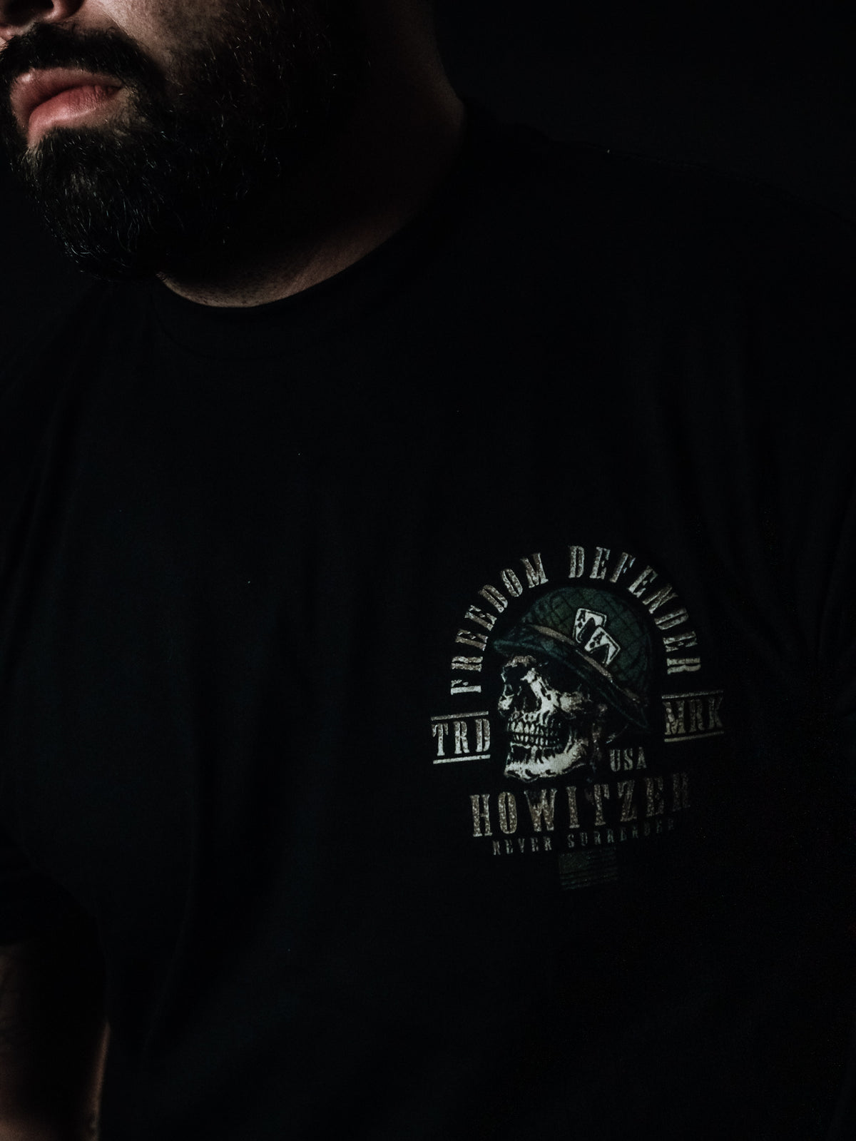 born united x howitzer - never surrender tee front