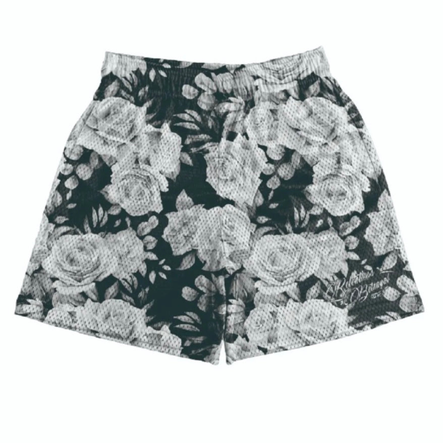 Relentless Betrayal Premium Mesh Shorts | 5- Beauty in Darkness: Black unisex gym shorts with a white and grey rose floral pattern, crafted from lightweight, comfortable fabric for everyday style.