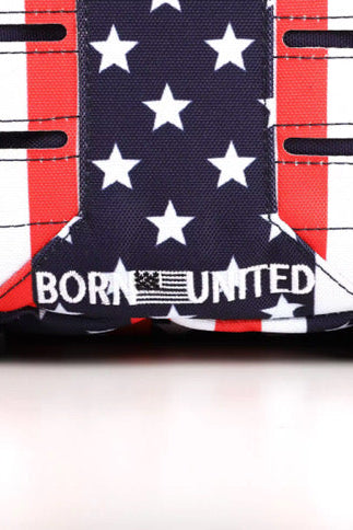 Close-up of the Ultimate Patriot Special Edition Tac-Pac - 25L by Born United Private Label, showcasing an American flag design with stars and stripes. The bold white BORN UNITED text is flanked by a small American flag graphic.
