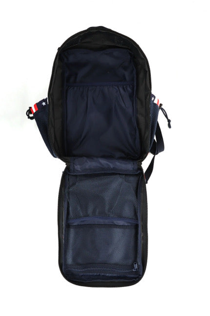 The Ultimate Patriot Special Edition Tac-Pac - 25L by Born United Private Label is shown flat, revealing a black exterior, main compartment, two mesh pockets, and dark blue interior with red, white, and blue accents on the straps.