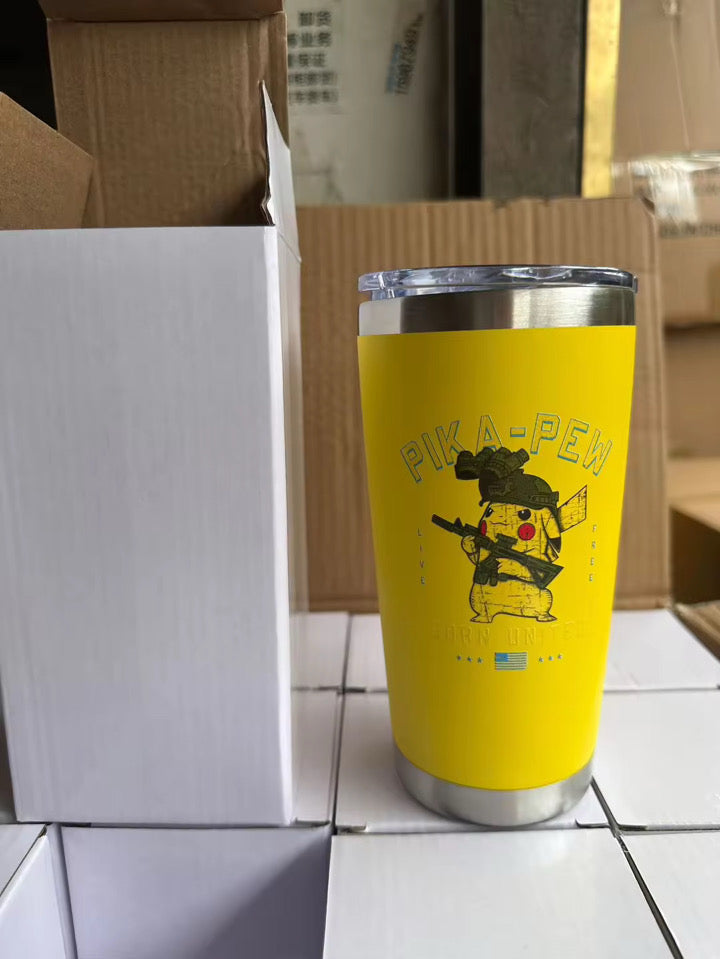 The Born United Private Label Pika-Pew Tumbler - 20oz, showing a cartoon Pikachu dressed as Rambo with “PIKA-PEW,” stands on white boxes beside a tall white cardboard box.