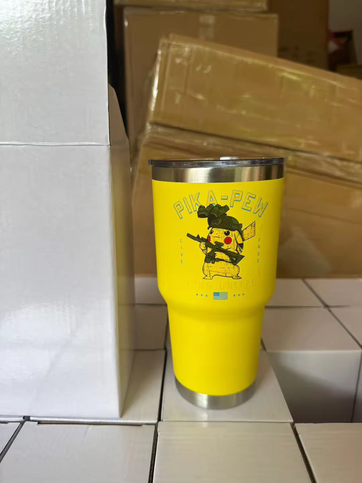 The 30oz Pika-Pew Tumbler by Born United Private Label features a yellow design with a cartoon Pikachu dressed as a cowboy holding a gun and the text "PIKA-PEW," shown among white boxes and cardboard boxes in the background.