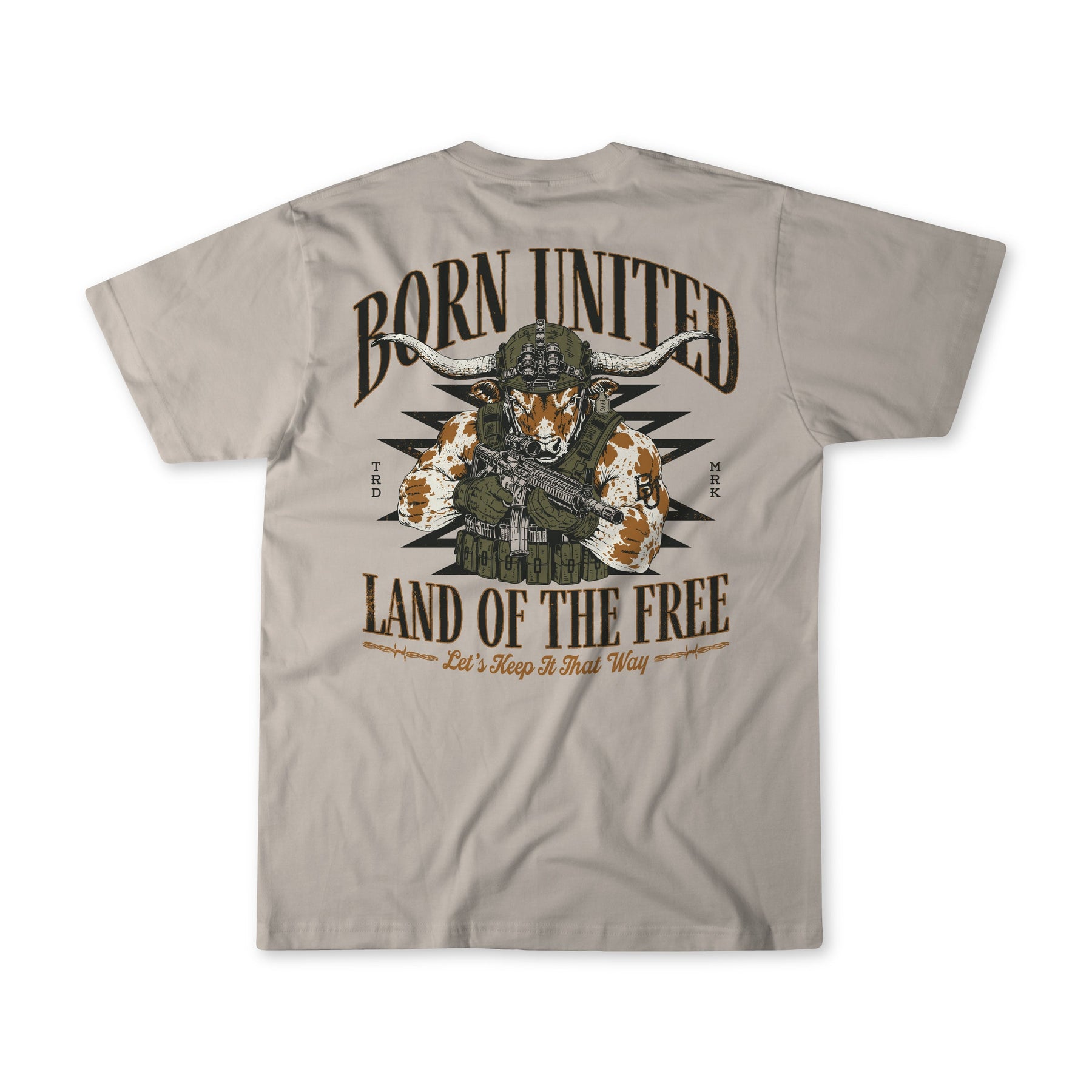 A light gray t-shirt shown from the back, featuring a large graphic print of a soldier with a longhorn and the text 'BORN UNITED' and 'LAND OF THE FREE'.