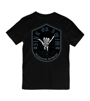 The Youth Sink or Swim Tee by Relentless Betrayal is a black t-shirt with a large shield graphic on the back, featuring a skeletal hand rising from water and the text Sink or Swim, Fearless Betrayal, plus the years 1979 and 2013.