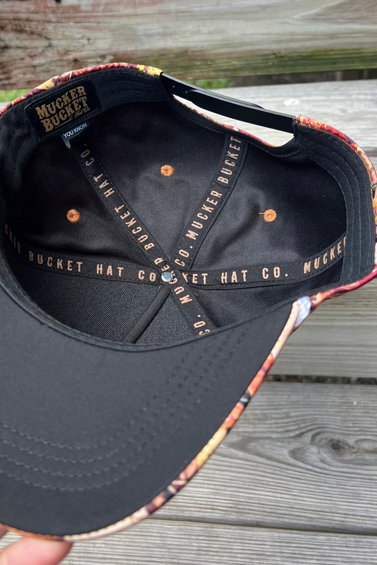 mucker bucket - chasin' tail fall camo curved brim hat