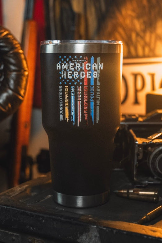 The Born United Private Label "American Heroes Tumbler - 30oz" features a black finish, an American flag, and “American Heroes” with corrections, dispatch, EMS, fire rescue, police & military listed on the front.