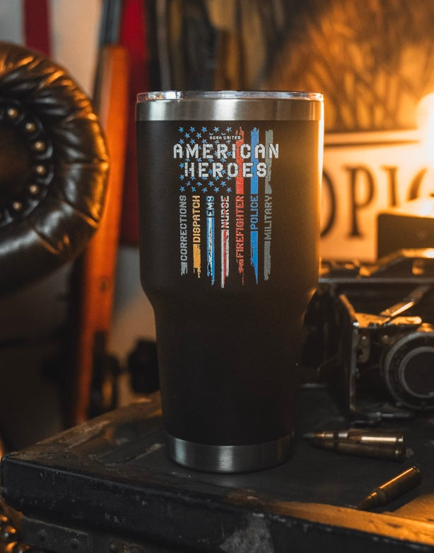 The Born United Private Label "American Heroes Tumbler - 30oz" features a black finish, an American flag, and “American Heroes” with corrections, dispatch, EMS, fire rescue, police & military listed on the front.