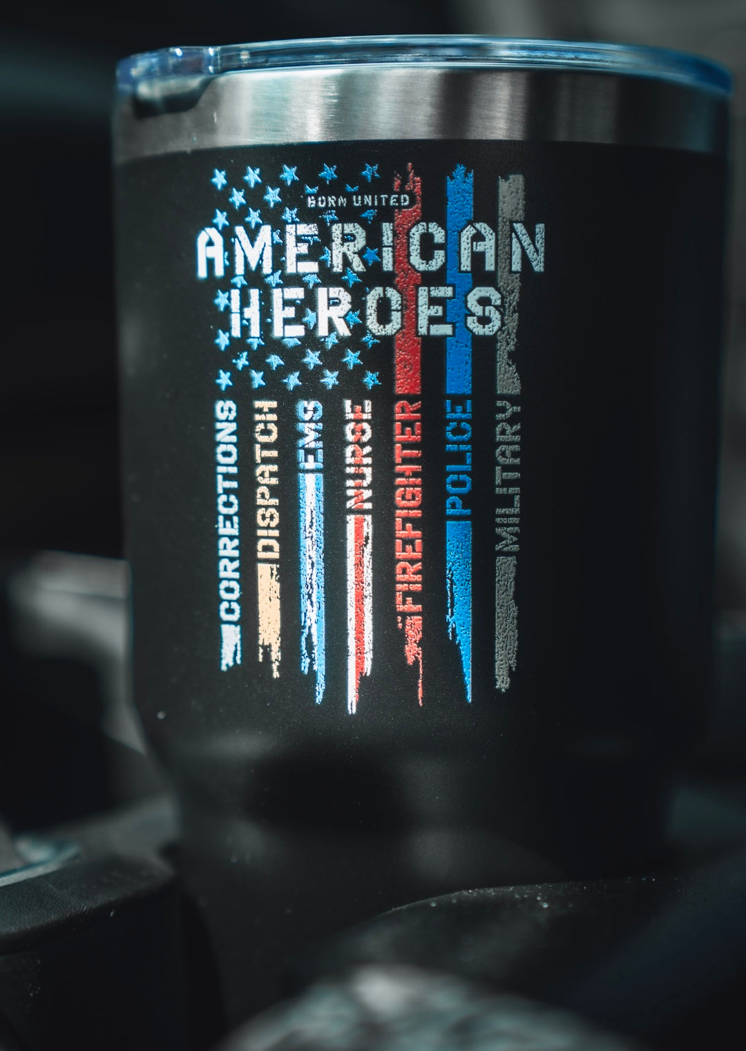 The Born United Private Label’s 30oz American Heroes Tumbler features black design, colored stripes labeled Corrections, Dispatch, EMS, Nurse, Firefighter, Police, Military—honoring first responders and service members.
