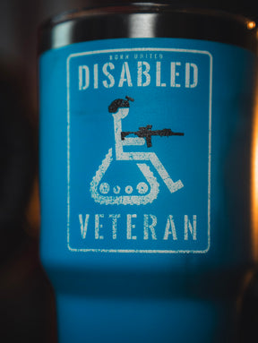 The Disabled Veteran Tumbler - 30oz by Born United Private Label features a blue design with a white wheelchair symbol holding a rifle and “Disabled Veteran” plus “Born United” at the top—ideal as a stainless steel disabled veteran tumbler.