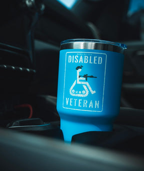 The Born United Private Label Disabled Veteran Tumbler - 30oz features “DISABLED VETERAN” with a wheelchair-tank graphic and fits most car cup holders—ideal for showing pride on the go.
