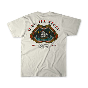The Into the Storm Premium Ivory T-Shirt by Relentless Betrayal features premium jersey cotton and a ship-in-creature graphic with INTO THE STORM on top and Restless Rugged, TFD, and FRK below in stylized fonts.