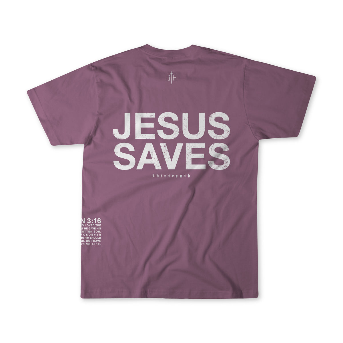 The Jesus Saves Berry Tee by 13th is a mauve shirt featuring bold white “JESUS SAVES” text on the back and John 3:16 in smaller print at the lower left.