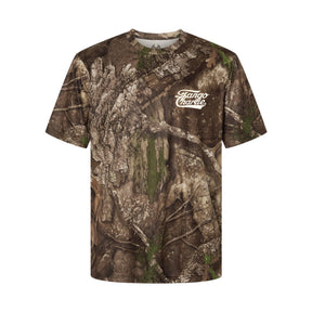 The Lift Heavy. Trust God. - Realtree Premium Camo Tee by Tango Charlie Apparel is a short-sleeve T-shirt with a brown and green camo pattern, featuring "Tango Charlie" in white script on the left chest.
