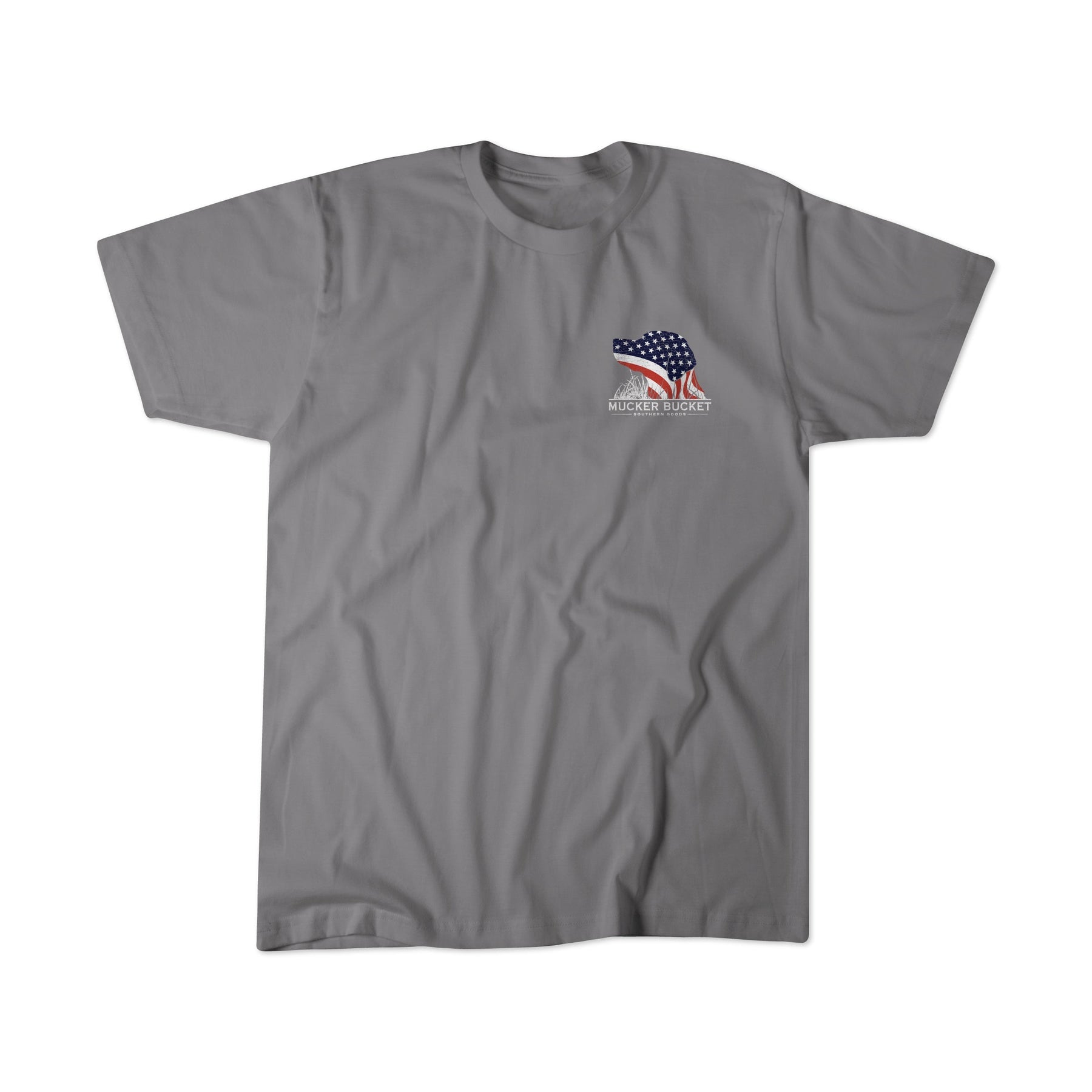 The Lab Flag Premium Tee by Mucker Bucket is a gray T-shirt featuring a small graphic of a turkey with an American flag pattern and the words “Nuclear Turkey” on the left chest. Crafted from soft ring-spun cotton, this premium relaxed fit tee ensures all-day comfort and standout style.