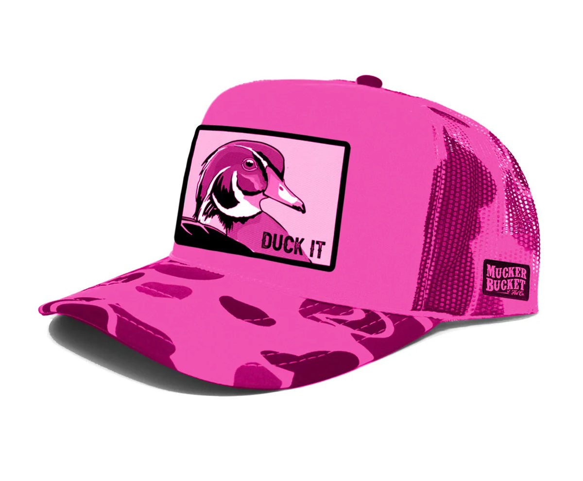 The Duck It Pink Camo Trucker Bucket by Mucker Bucket is a pink snapback trucker hat with a cartoon duck face, DUCK IT on the front panel, and a mesh back.