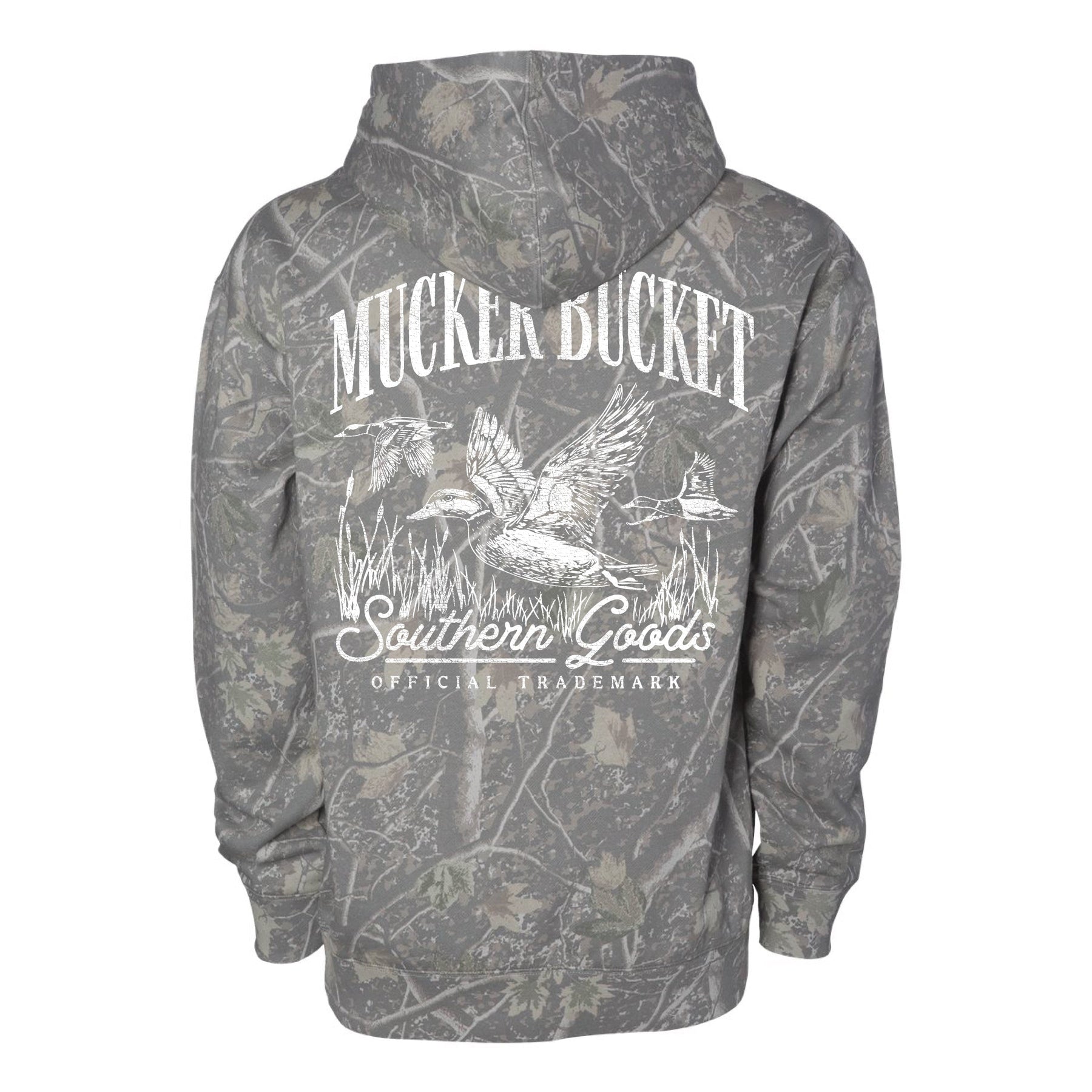 The Mucker Bucket Mallard Deadwood Camo Hoodie is a stylish fleece with a relaxed fit, showcasing a bold white flying ducks and reeds graphic plus Mucker Bucket Southern Goods OFFICIAL TRADEMARK on the back.