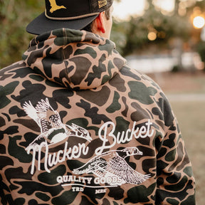 mucker bucket - wood duck camo hoodie back on model