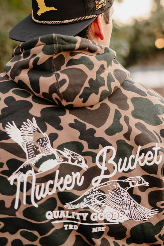mucker bucket - wood duck camo hoodie back on model
