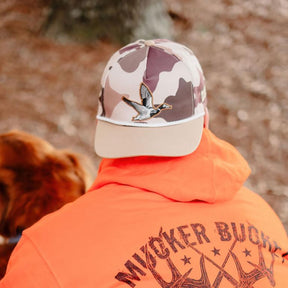 mucker bucket - leaf camouflage duck embroidered hat on model