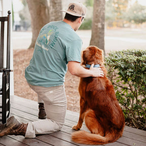 mucker bucket - duck duck boom premium t-shirt on men's model