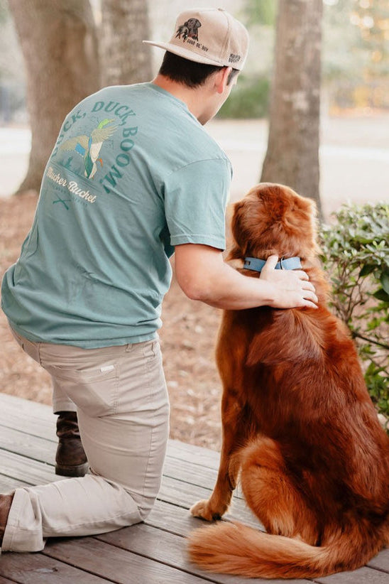 mucker bucket - duck duck boom premium t-shirt on men's model