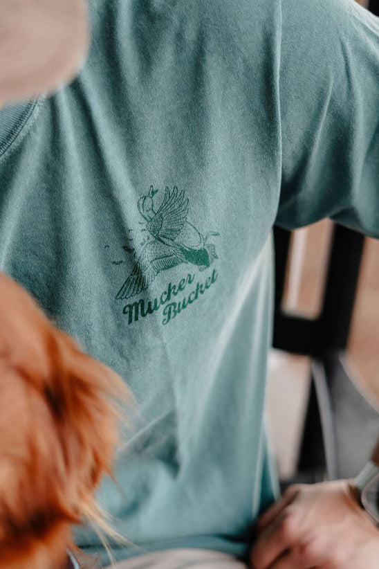 mucker bucket - duck duck boom premium tee front on model