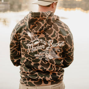 mucker bucket - wood duck camouflage hoodie back on model