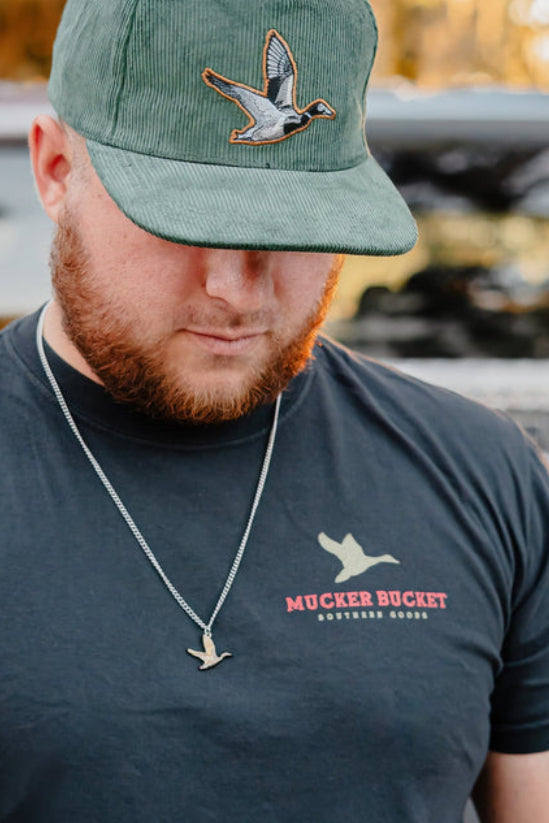 mucker bucket - trucks, ducks & bucks premium tee front on men's model