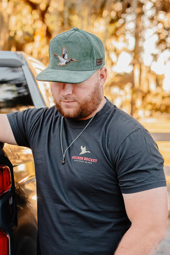 mucker bucket - trucks, ducks & bucks premium tee front on model