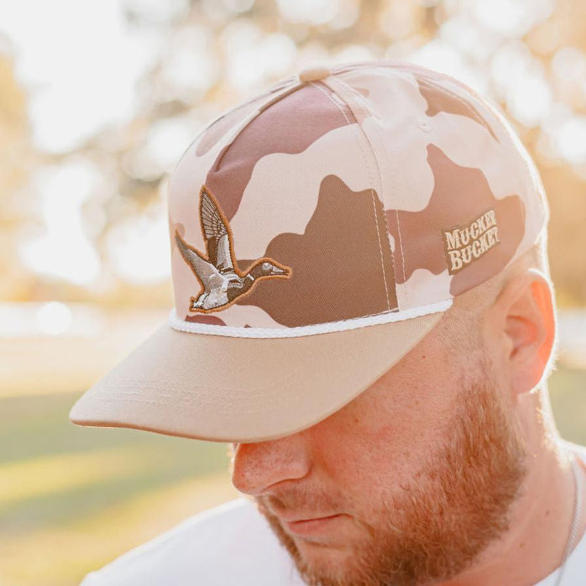 mucker bucket - leaf camouflage duck two toned hat on model