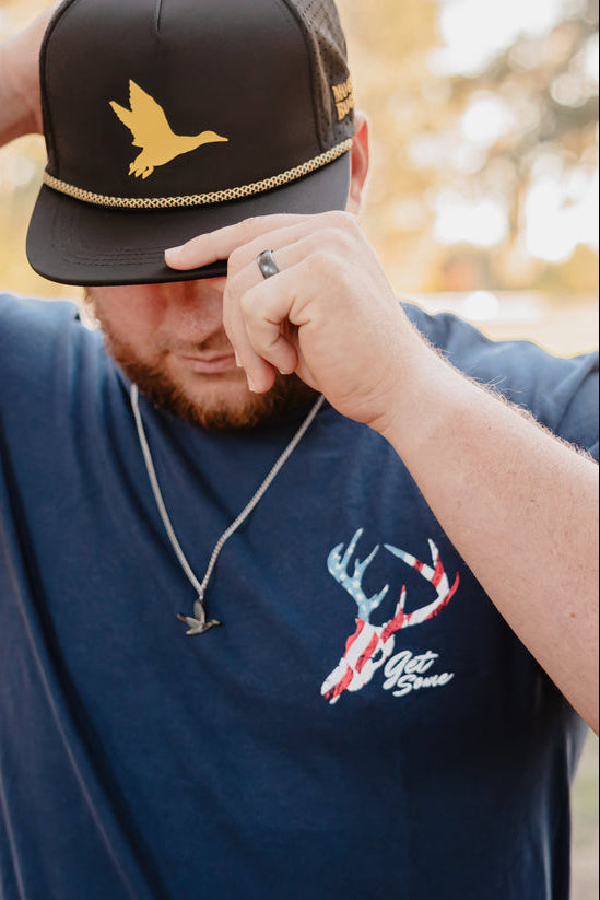 mucker bucket - get some premium tee front on model