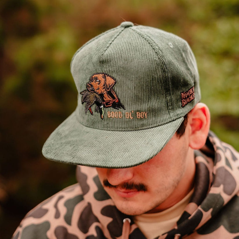 mucker bucket - good ol' boy green corduroy hat on model