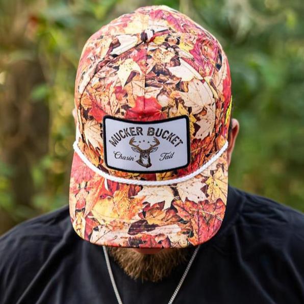 mucker bucket - chasin' tail fall camo bucket hat on model