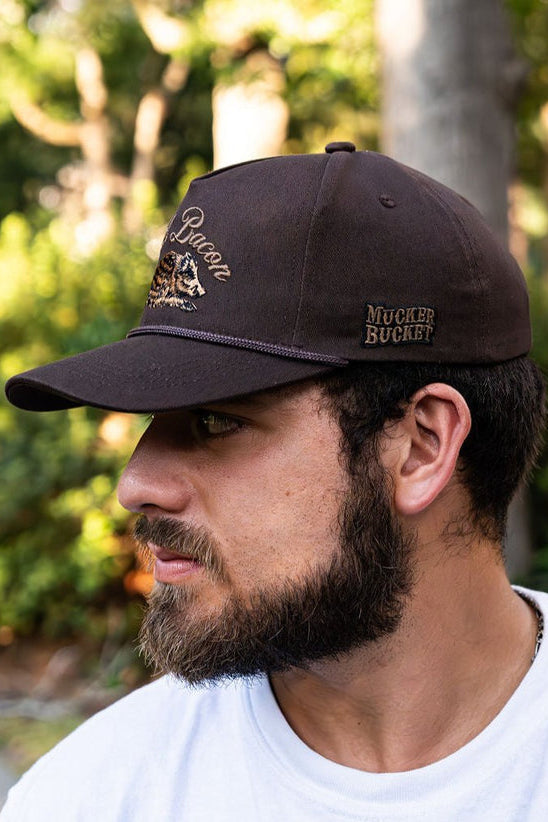 mucker bucket - wild bacon vintage hat side view on model