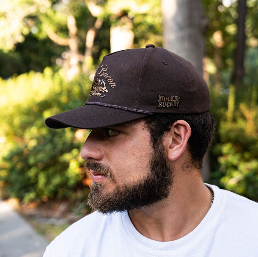 mucker bucket - wild bacon vintage hat side view on model