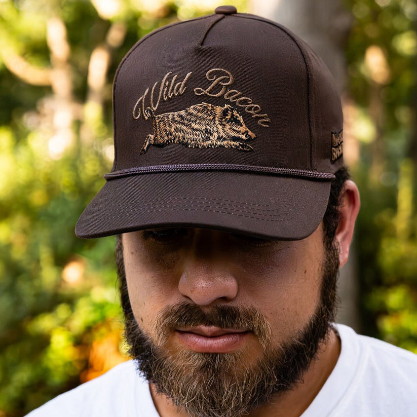 mucker bucket - wild bacon vintage hat on model