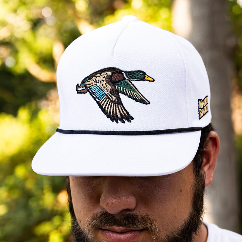 mucker bucket - mallard trucker hat on model