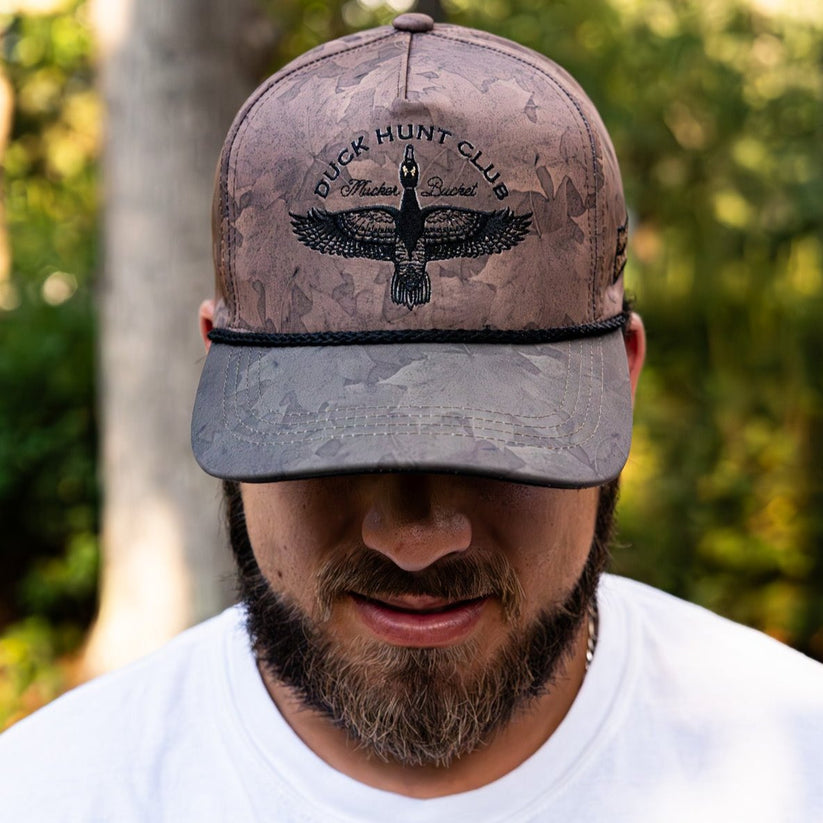 mucker bucket - duck hunt club swamp leaf hat on model