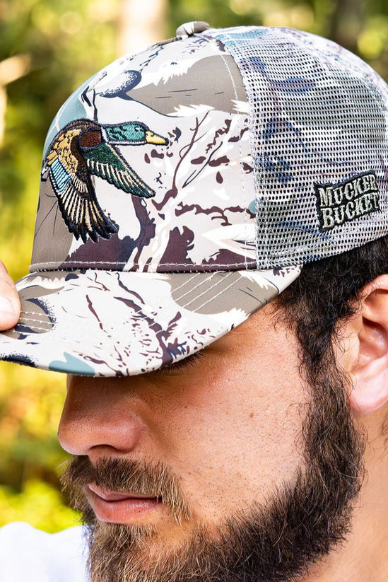 mucker bucket - mallard big woods trucker hat on model