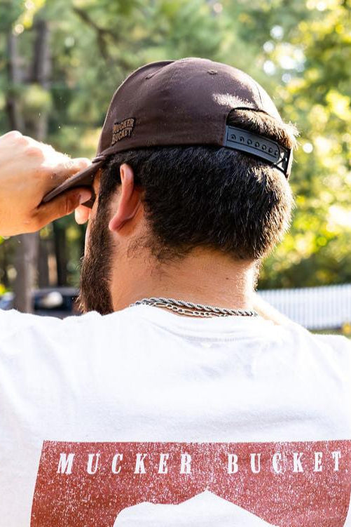 mucker bucket - wild bacon vintage hat back view on model