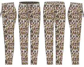 Four pairs of Mucker Bucket Men's Classic Premium Joggers in Old School Duck Camo are shown front and back. Made with quick-drying fabric, they feature a small white MUGGER BLOOD logo on the left thigh—perfect for running in comfort.