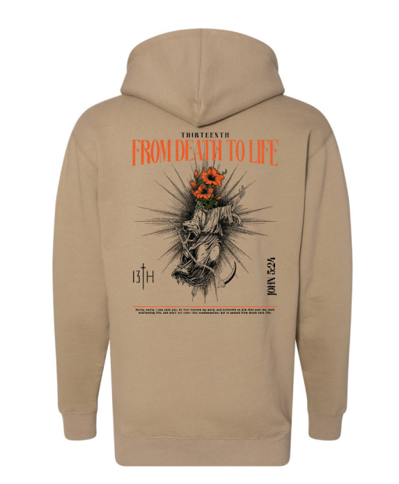 The From Death to Life Ultra Premium Hoodie by 13th features a tan color, FROM DEATH TO LIFE text, figure with flowers, and a John 5:24 verse graphic on the back.