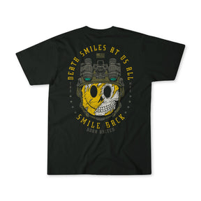 The Smile Back t-shirt from Born United Private Label features a graphic half-yellow, half-white skull in night vision goggles, bold “Death smiles at us all, smile back” text, star accents, and delivers a stoic philosophy-inspired look.