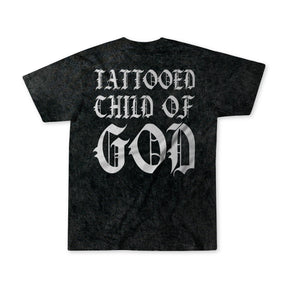 The Tattooed Child of God Premium Mineral Wash T-Shirt by Relentless Betrayal features a black marbled look and bold gothic-style white back text—Tattooed Child of God—a standout piece of Christian apparel.