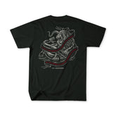 The Last Stand by Born United Private Label: a limited edition black tee with a lion fighting a serpent and a red G.K. Chesterton quote ribbon on the back, made for The Last Stand Festival. Laid flat to highlight the bold design.
