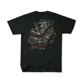 The Last Stand by Born United Private Label: a limited edition black tee with a lion fighting a serpent and a red G.K. Chesterton quote ribbon on the back, made for The Last Stand Festival. Laid flat to highlight the bold design.